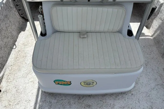Slide: The Image of White cushioned seat on a 2001 Polar 1780 Flat boat with stickers. - 20