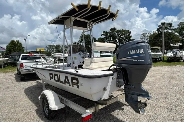 Slide: The Image of 2001 Polar 1780 Flat boat with Yamaha engine on trailer, parked outdoors. - 7