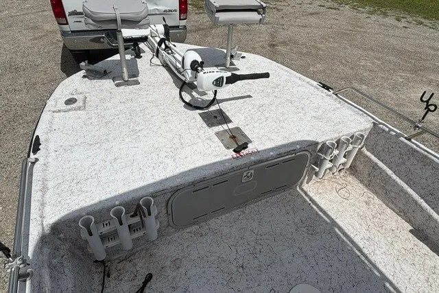 Slide: The Image of 2001 Polar 1780 Flat boat deck with fishing rod holders and trolling motor. - 11