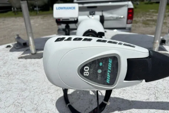 Slide: The Image of Trolling motor on 2001 Polar 1780 Flat boat with Lowrance equipment in background. - 27