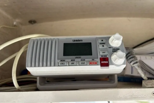 Slide: The Image of Uniden UM385 marine radio with distress button, mounted on Polar 1780 Flat boat. - 23