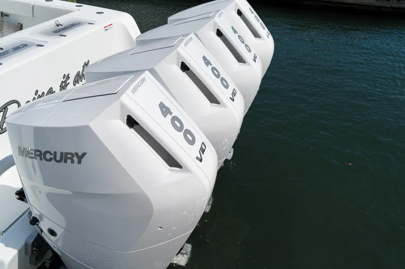 Slide: The Image of Four Mercury 400 V8 outboard engines on a 2026 Contender 44 ST boat. - 30