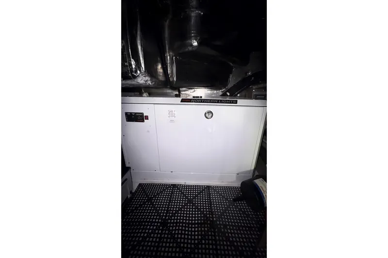 Slide: The Image of Engine room of 2000 Riviera 48 Convertible with Northern Lights generator. - 18