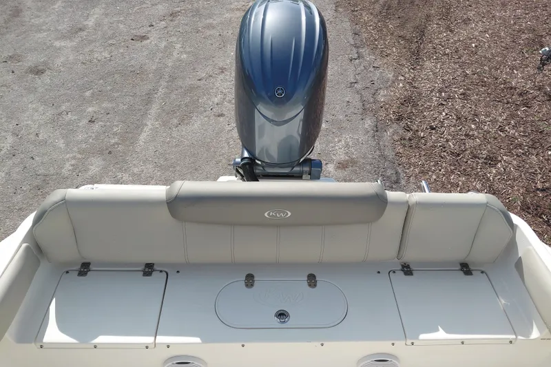 Slide: The Image of 2024 Key West 219 FS boat with Yamaha outboard motor, rear seating view. - 29