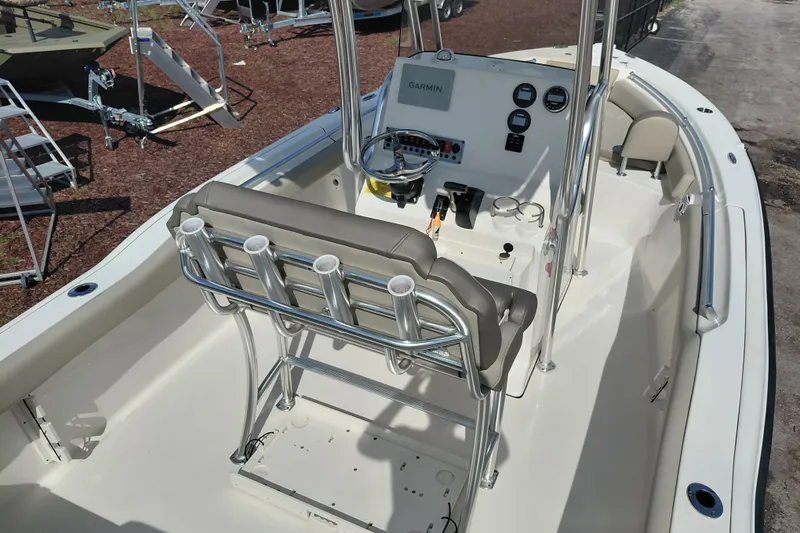 Slide: The Image of 2024 Key West 219 FS boat interior with steering console and seating. - 35