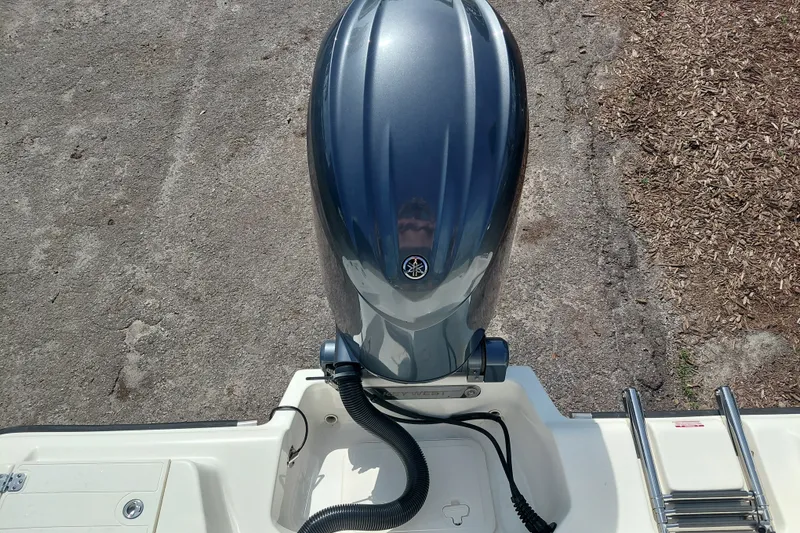 Slide: The Image of 2024 Key West 219 FS boat with Yamaha outboard motor, viewed from above. - 31