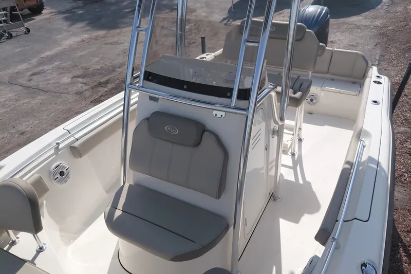 Slide: The Image of 2024 Key West 219 FS boat interior with seating and console, showcasing modern design. - 37