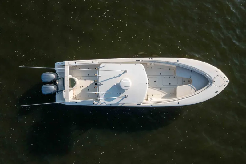 Slide: The Image of Aerial view of 2005 Pursuit 3480 Center Console boat on water. - 47