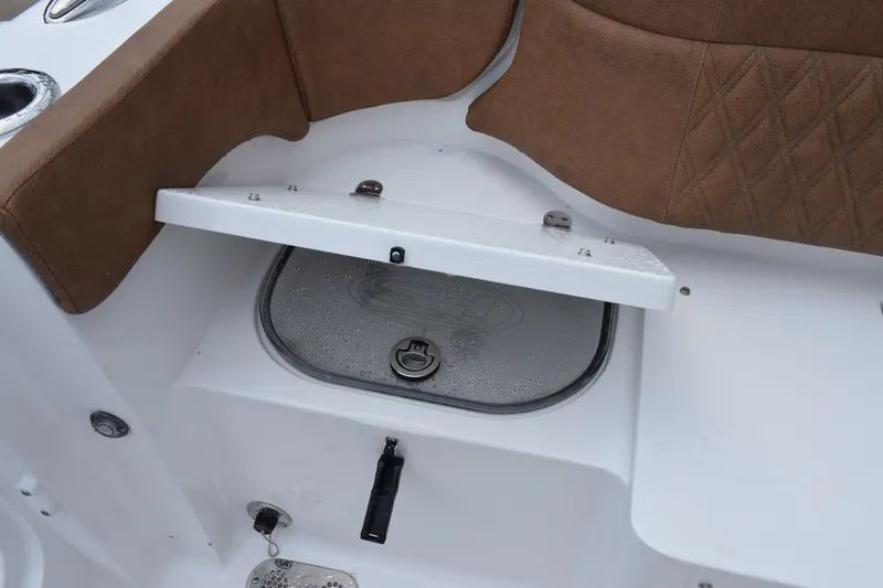 Slide: The Image of Interior seating and storage compartment of 2027 Sea Hunt Ultra 285SE boat. - 23