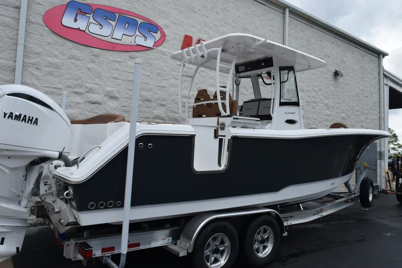 Slide: The Image of 2027 Sea Hunt Ultra 285SE boat with Yamaha engine on trailer at dealership. - 4