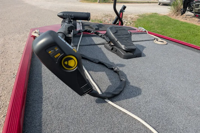 Slide: The Image of 2021 Tracker Bass Tracker Classic XL boat deck with trolling motor and foot pedal. - 64