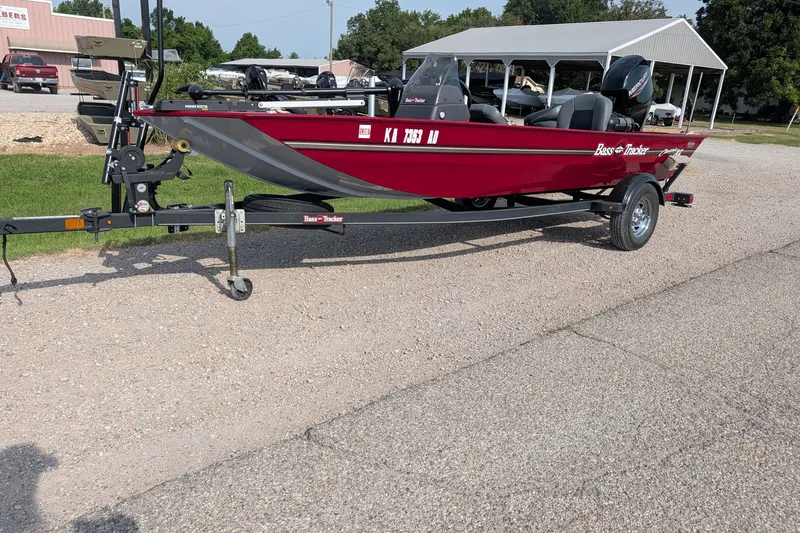 The Image of 2021 Tracker Bass Tracker Classic XL boat on trailer, parked outdoors. - 48