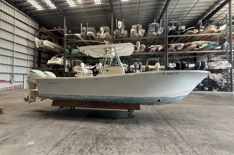 Slide: The Image of 2007 Regulator 26 Classic boat in indoor storage facility. - 15