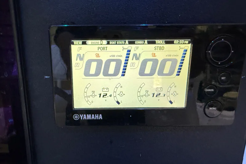Slide: The Image of Yamaha engine display on 2007 Regulator 26 Classic boat, showing RPM and voltage. - 24
