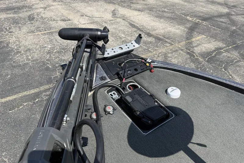 Slide: The Image of 2018 Skeeter FX21 boat deck with trolling motor and electronic controls. - 18