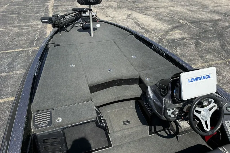 Slide: The Image of 2018 Skeeter FX21 boat interior with Lowrance electronics and steering wheel. - 7