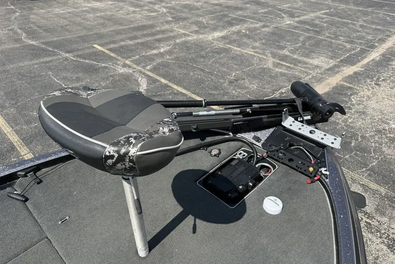 Slide: The Image of 2018 Skeeter FX21 boat deck with seat and trolling motor setup. - 10