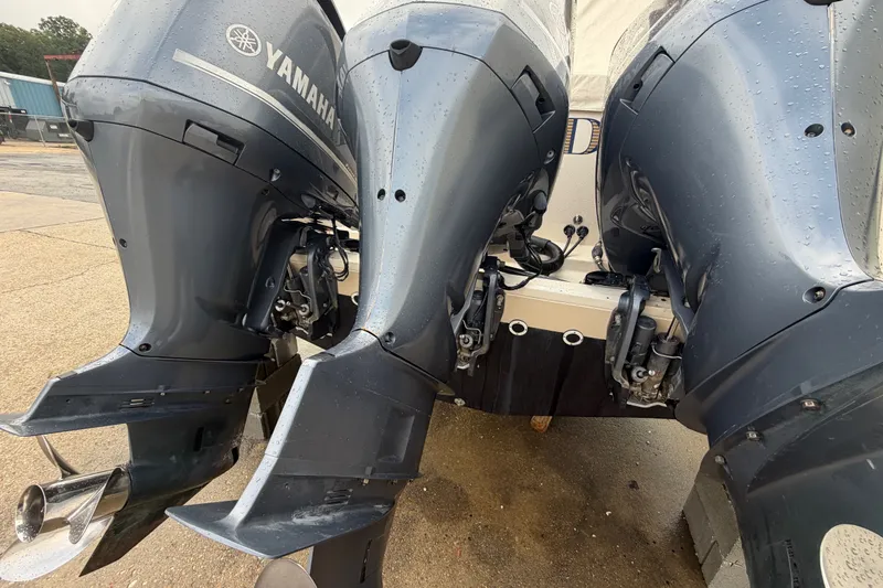Slide: The Image of Twin Yamaha outboard motors on a 2017 Grady-White Freedom 335 boat. - 5