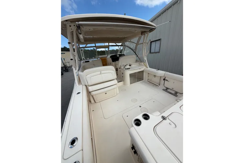 Slide: The Image of 2017 Grady-White Freedom 335 boat interior with spacious seating and modern amenities. - 10