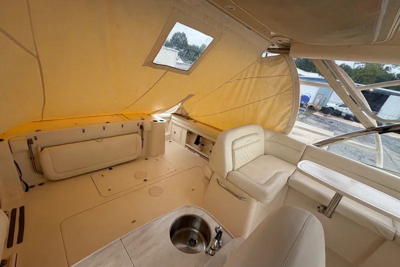 Slide: The Image of Interior of 2017 Grady-White Freedom 335 boat with seating and sink. - 8