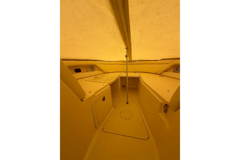 Slide: The Image of Interior view of 2017 Grady-White Freedom 335 boat, showcasing seating and storage areas. - 18