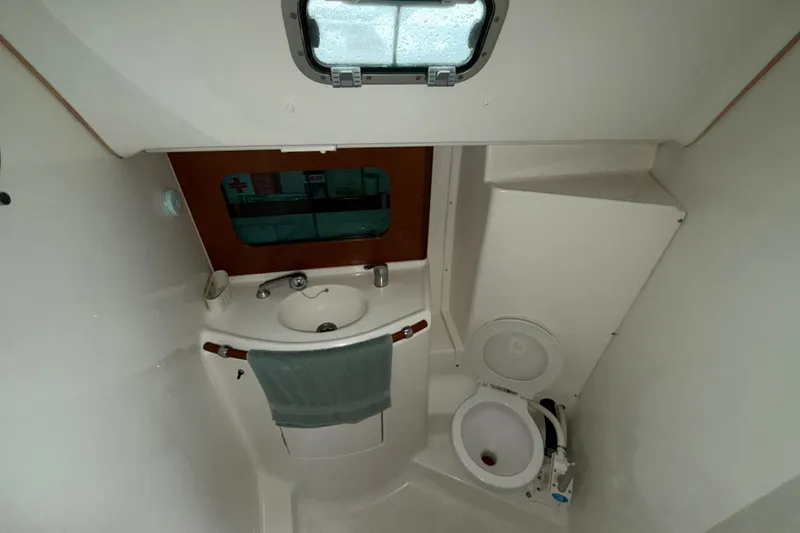 Slide: The Image of Bathroom interior of a 2001 Beneteau 331 sailboat, featuring sink and toilet. - 30