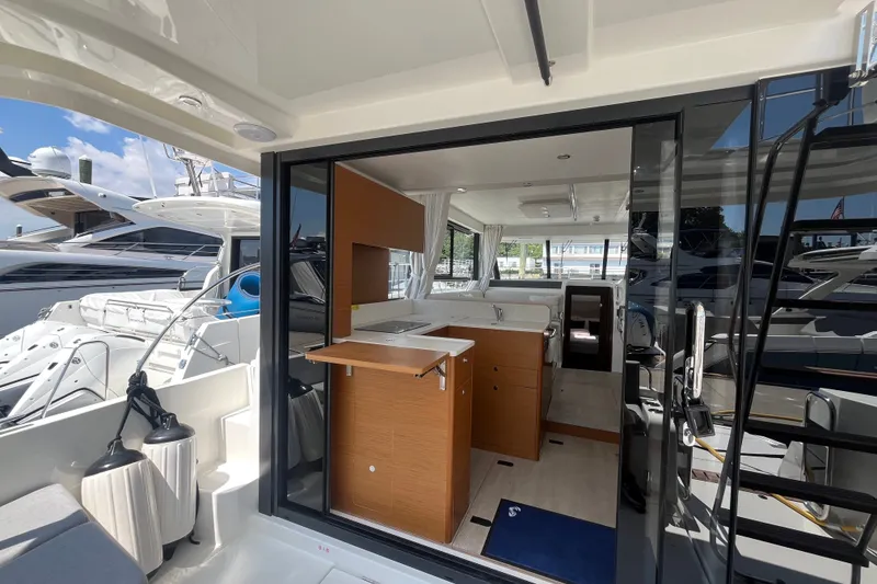 Slide: The Image of Interior view of 2026 Beneteau Swift Trawler 41 Fly yacht, showcasing modern design and amenities. - 13
