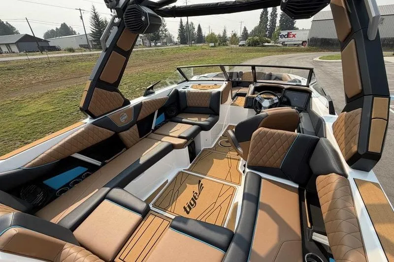 Slide: The Image of 2027 Tigé Z3 boat interior with luxurious seating and modern design. - 5
