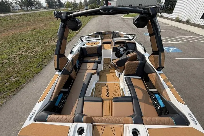 Slide: The Image of Luxurious 2027 Tigé Z3 boat interior with premium seating and advanced audio system. - 13