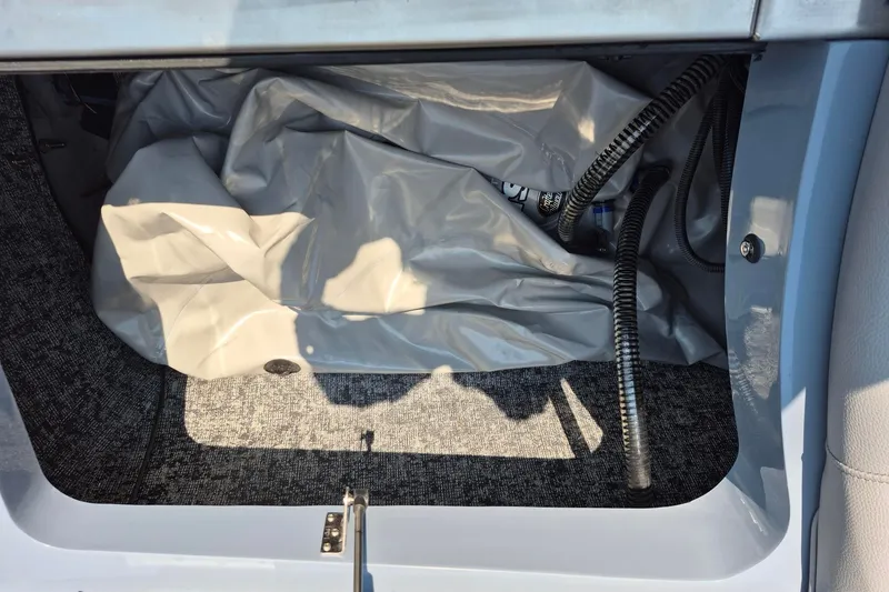 Slide: The Image of Storage compartment of 2027 MB B52-23 Classic LIMITED with hoses and fabric. - 13