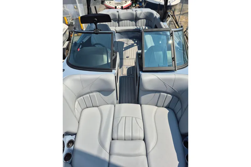 Slide: The Image of 2027 MB B52-23 Classic LIMITED boat interior with luxurious gray seating and sleek design. - 7