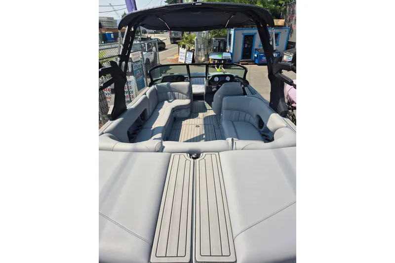 Slide: The Image of 2027 MB B52-23 Classic LIMITED boat interior with sleek seating and modern design. - 8