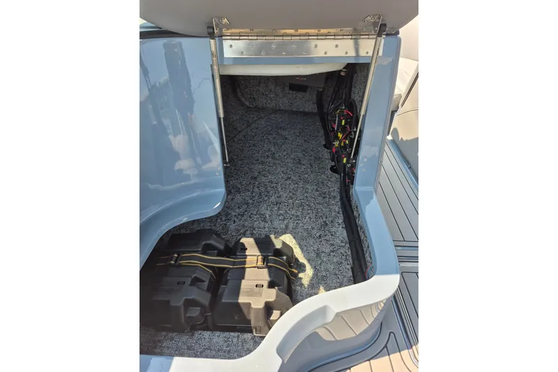 Slide: The Image of 2027 MB B52-23 Classic LIMITED storage compartment with wiring and battery setup. - 11