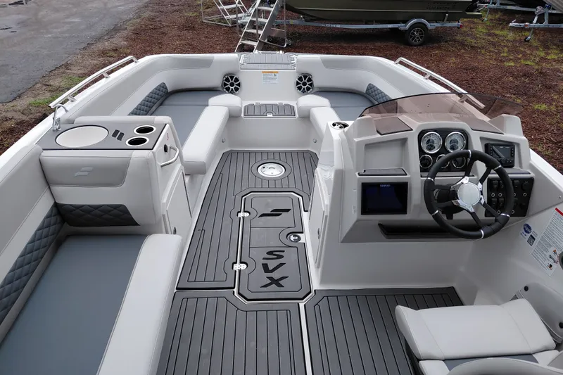 Slide: The Image of 2027 Starcraft SVX 211 OB boat interior with modern dashboard and seating. - 14