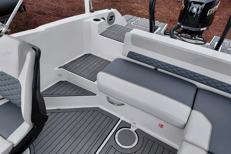 Slide: The Image of Interior of 2027 Starcraft SVX 211 OB boat with sleek seating and modern design. - 25