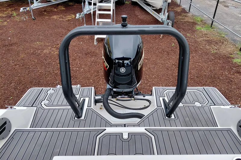 Slide: The Image of 2027 Starcraft SVX 211 OB boat with Yamaha outboard motor, rear view. - 23