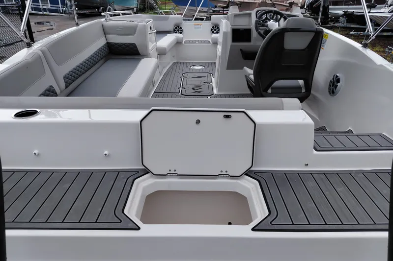 Slide: The Image of 2027 Starcraft SVX 211 OB boat interior with sleek seating and modern design. - 26