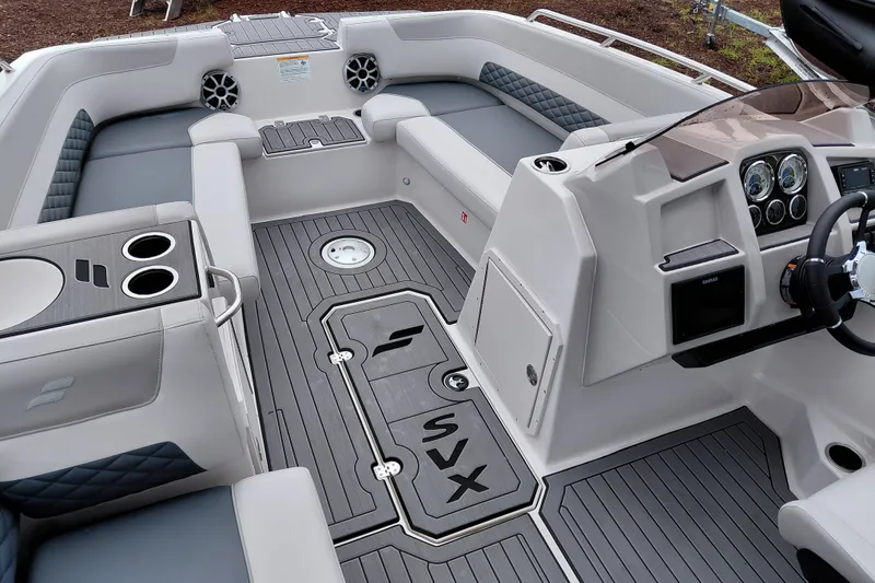 Slide: The Image of 2027 Starcraft SVX 211 OB boat interior with modern seating and sleek dashboard design. - 19