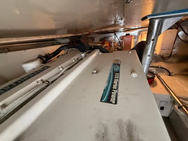 Slide: The Image of Engine room of a 1997 Ocean Yachts 40ss with a Marine Power engine. - 19