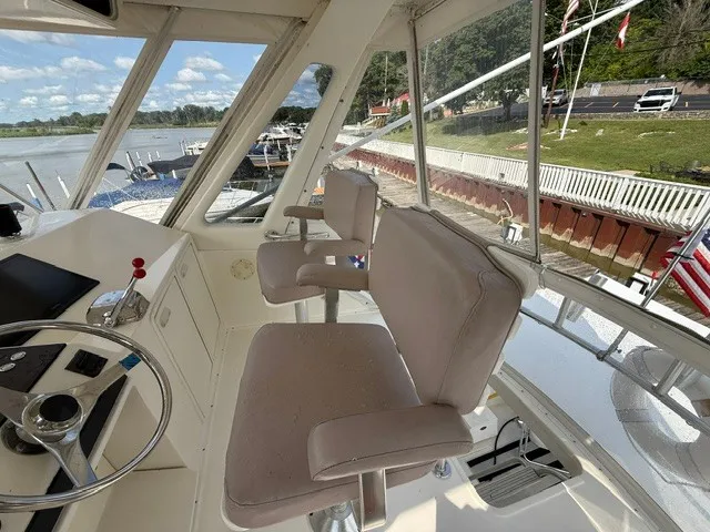 Slide: The Image of Interior view of the 1997 Ocean Yachts 40ss with helm and two seats. - 5