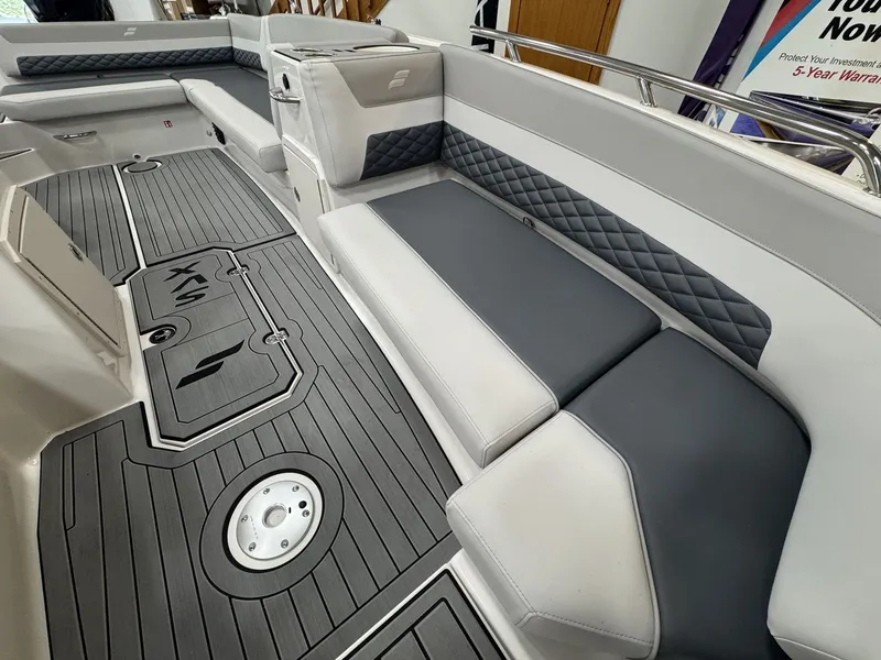 Slide: The Image of Interior of a 2027 Starcraft 211SVXOB with gray and white upholstery and modern flooring. - 31