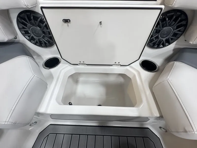 Slide: The Image of Interior view of a Starcraft 211SVXOB boat with speakers and storage compartment. - 34