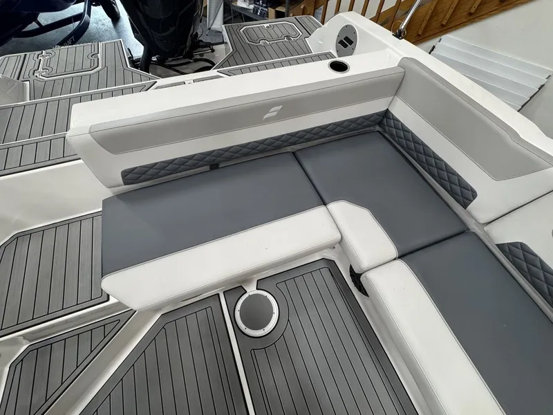 Slide: The Image of The image shows the gray and white upholstery of a 2027 Starcraft 211SVXOB. - 11