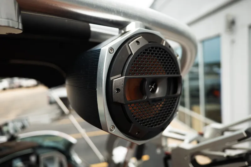 Slide: The Image of Close-up of a 2020 MasterCraft XT25 boat speaker, showcasing sleek design and craftsmanship. - 33