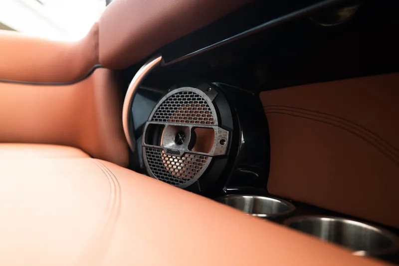Slide: The Image of Luxury interior of 2020 MasterCraft XT25 boat with premium speaker and cup holders. - 30