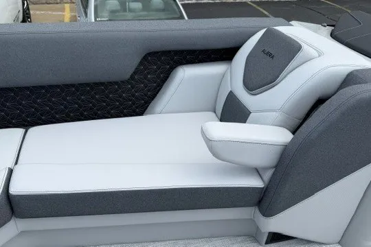 Slide: The Image of Luxurious seating in a 2027 Alera M25Q boat, featuring sleek gray and white upholstery. - 52