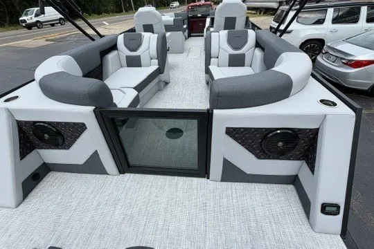 Slide: The Image of Luxurious 2027 Alera M25Q pontoon boat interior with plush seating and modern design. - 21