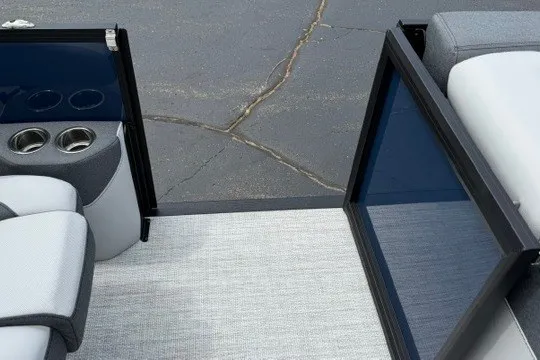 Slide: The Image of Alera M25Q 2027 boat interior with open door, cup holders, and cushioned seating. - 71