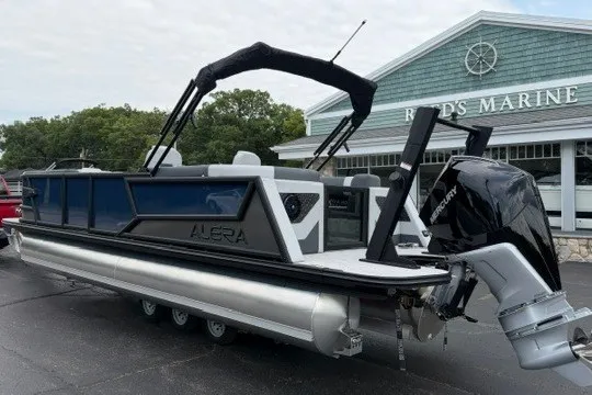 Slide: The Image of 2027 Alera M25Q pontoon boat with Mercury engine at Bird's Marine dealership. - 11