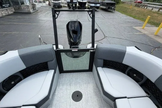 Slide: The Image of Interior view of 2027 Alera M25Q boat with modern seating and motor. - 78